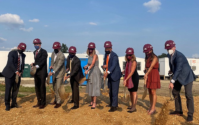 Gov. Ralph Northam, second from left, and Alexandria Mayor Justin Wilson, fourth from left, are joined by local dignitaries and development officials at the Sept. 14 groundbreaking for the Virginia Tech Innovation Campus at Potomac Yard.