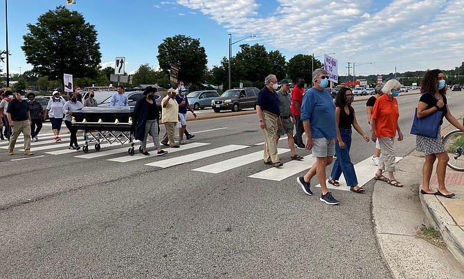 Gum Springs residents protest the Richmond Highway widening project.