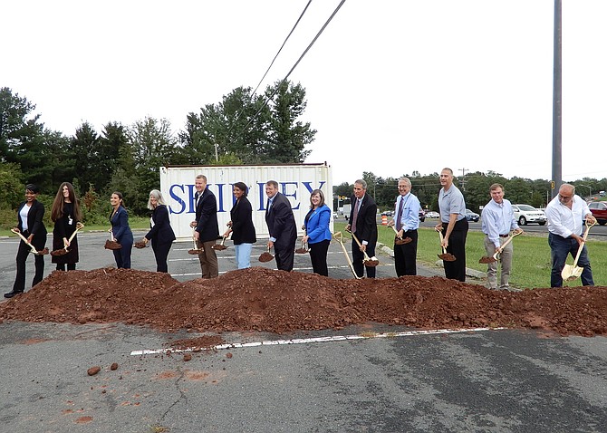 Officials break ground for the Route 28 widening. In the center are Jeff McKay, Phyllis Randall, Pat Herrity, Kathy Smith (blue jacket) and John Lynch. Del. Danica Roem and Sen. Jennifer Boysko are on the left.