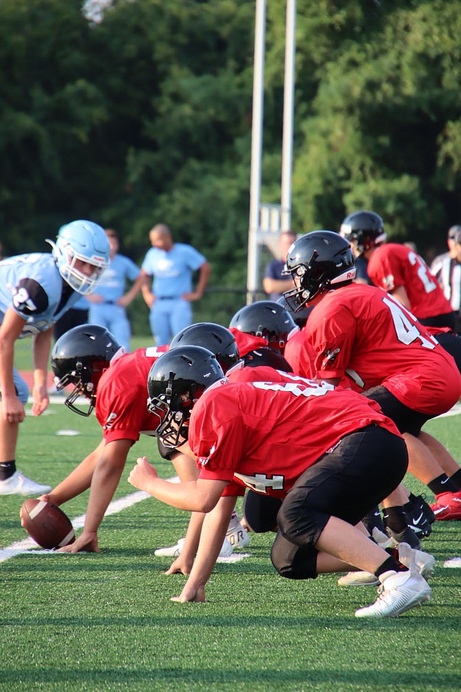 Herndon High School’s offensive line squares up against South Lakes