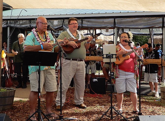 Performing is a group called Naniukulelejoy.