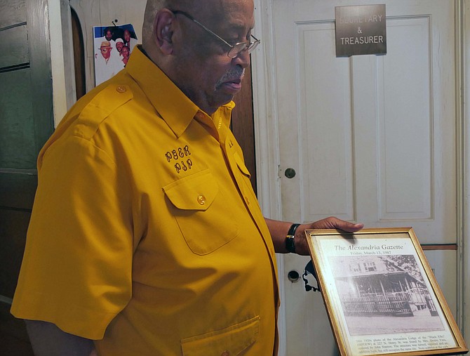 Harold Hughes illustrates one of the historical pictures of the Lodge; this one appeared in the Alexandria Gazette in 1987.
