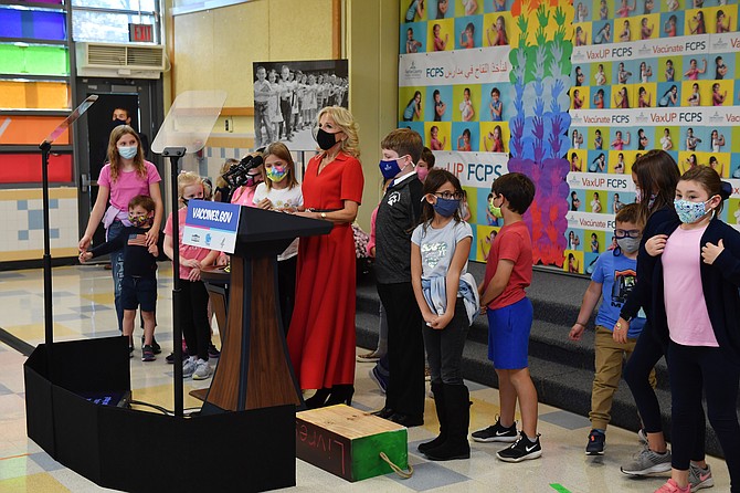 First Lady Dr. Jill Biden talks with a Franklin Sherman Elementary School student in McLean.