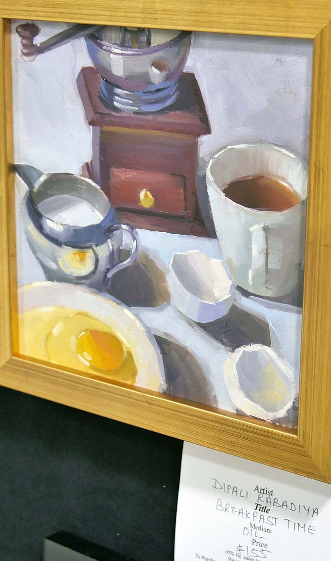 Dipali Rabadiya won first place for her painting “Eggs and Cups,” which has been sold and claimed. This painting, also by Rabadiya, has a similar theme.