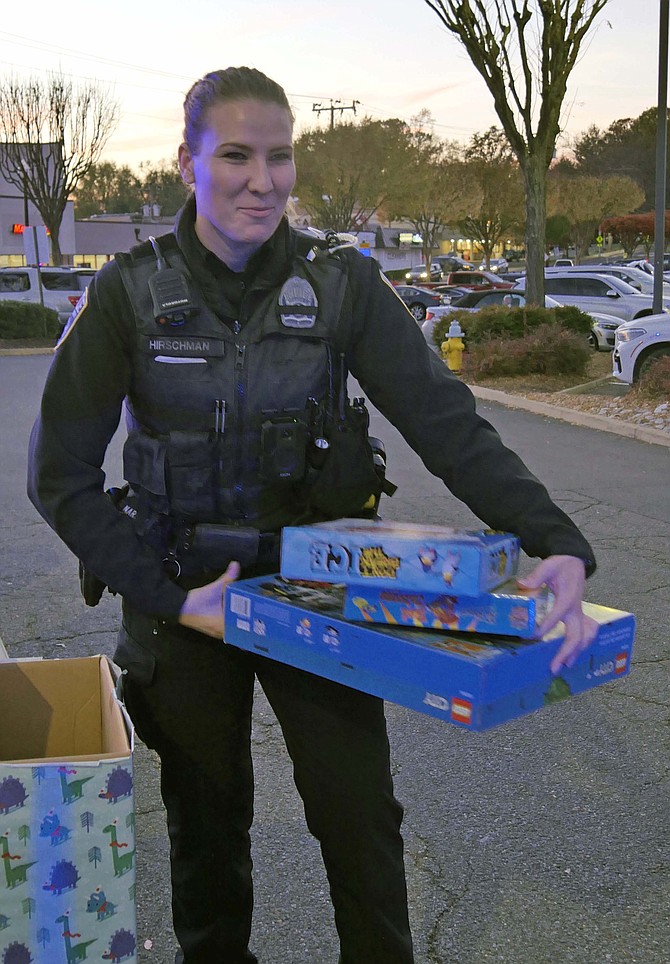 Officer Carly Hirschman just joined the ACPD Community Outreach unit six months ago, and this is her first toy drive event.