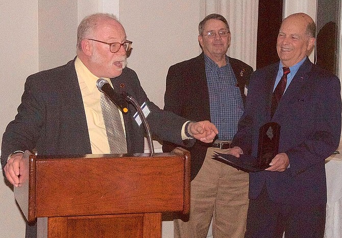 From left, Jeff Parnes thanks the attendees for honoring him, while Mike Frey and Bill Barfield, Federation past president, look on. Frey is the former Sully District Supervisor who appointed Parnes as Sully District Transportation Advisory Commissioner in 2004.