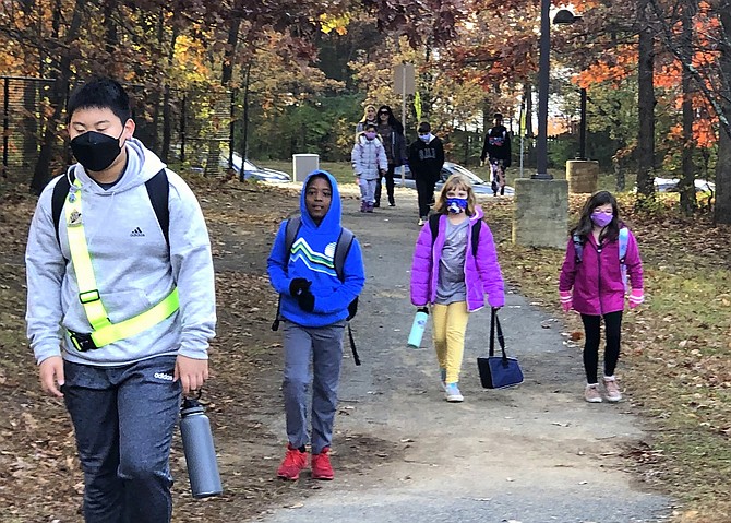 Children walking to Centreville Elementary in honor of Ruby Bridges