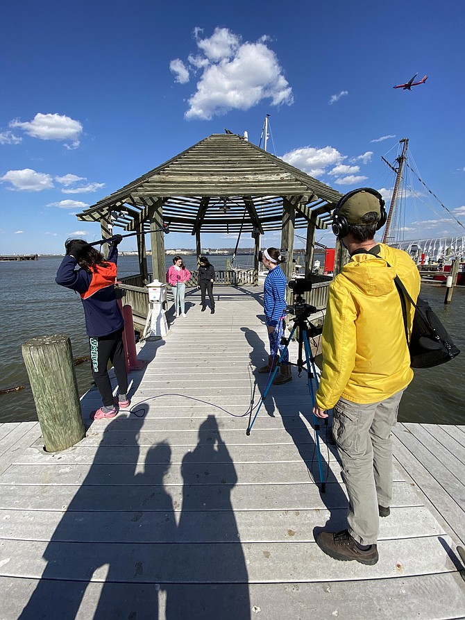 Dad helps shoot a scene out on the river. “The Homework Club,” created by 15-year-old Hallie Crawford landed a spot in the 2021 Alexandria Film Festival.