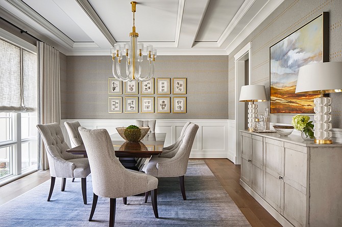 Interior designer Tracy Morris uses a gray tweed wallcovering in the dining room of her McLean home to create a sophisticated atmosphere.  Photos by Greg Powers