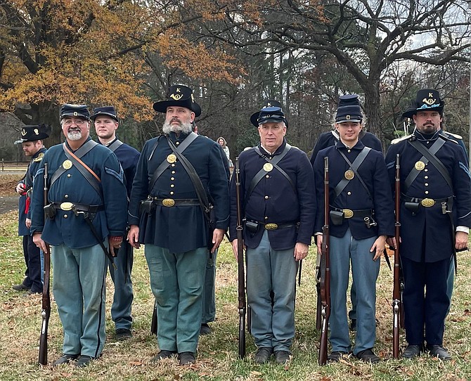 A regiment of reenactors of the 3rd U.S. Regular Infantry Company K during the Civil War Christmas in Camp program Dec. 11 at Fort Ward Museum.