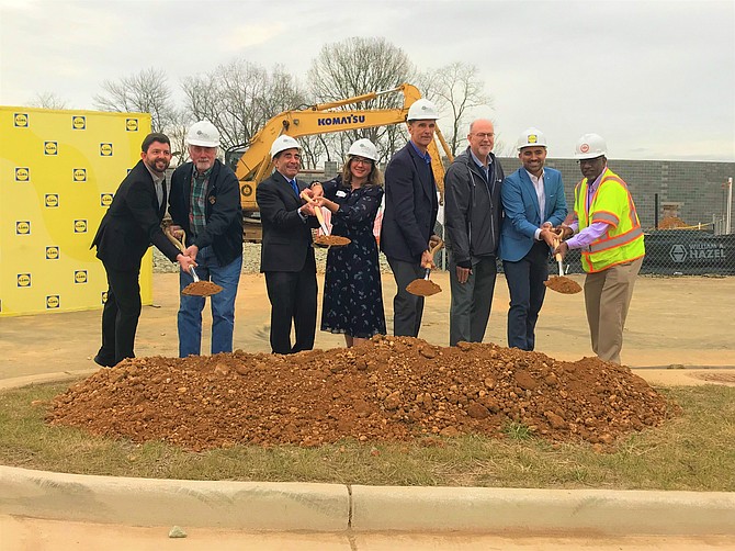 At the groundbreaking, Casey Whitmarsh, South County Chamber of Commerce; Larry Clark, South County Federation; Alan Weiss, Fairfax County Assistant County Attorney; Christine Morin, Chief of Staff; Mount Vernon Supervisor Dan Storck, Fairfax County Mount Vernon District; Jim Perry, Elm Street Development; Nick Cacaci, Lidl; Gasim Elfaki, Fairfax County DPWES Public Private Partnership Coordinator.
