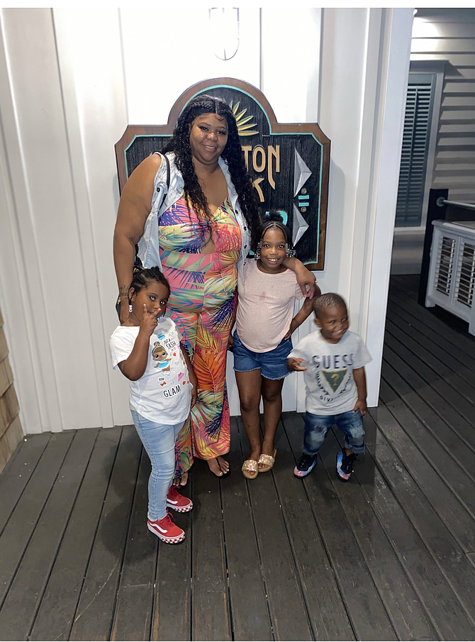 African American parents and grandparents, like Vonetia Hartley, pictured here with three of her grandchildren, are giving their offspring in-depth lessons during Black History Month.  Photo courtesy of Vonetia Hartley