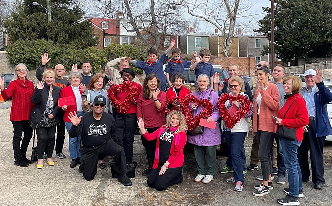 Volunteers and donors gather for a photo with organizer Frank Fannon at the 14th annual Alexandrians Have Heart food and clothing drive Feb. 12.