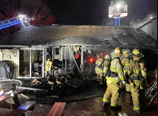 Fire investigators determined that improperly discarded ashes from an outdoor fire pit caused this house fire in the Wolf Trap neighborhood.