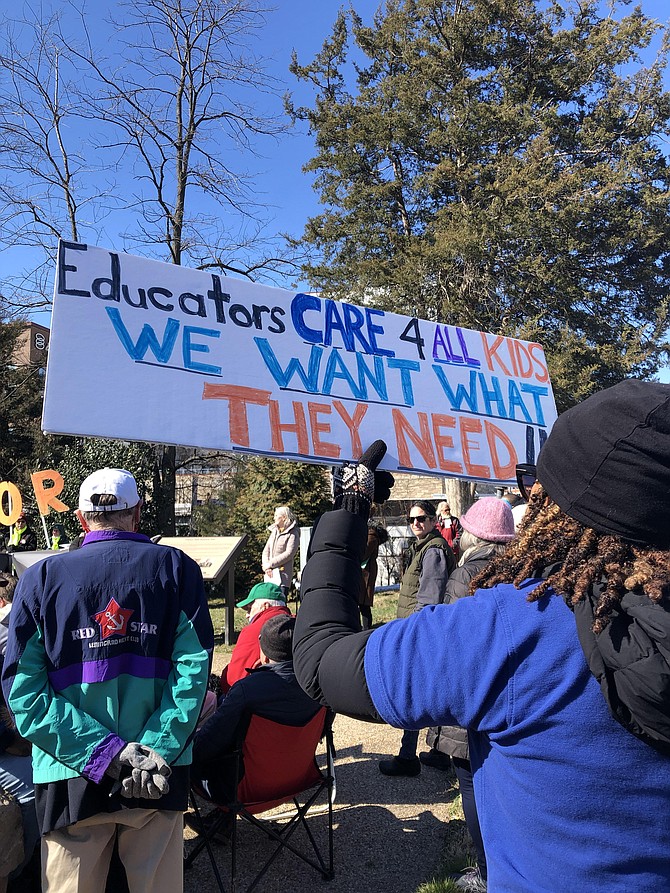 One sign at the protest. The event brought together almost 200 parents, students, and teachers. Teachers’ consistent theme: educators care for all students; teachers are not threats but part of the support structure kids need.