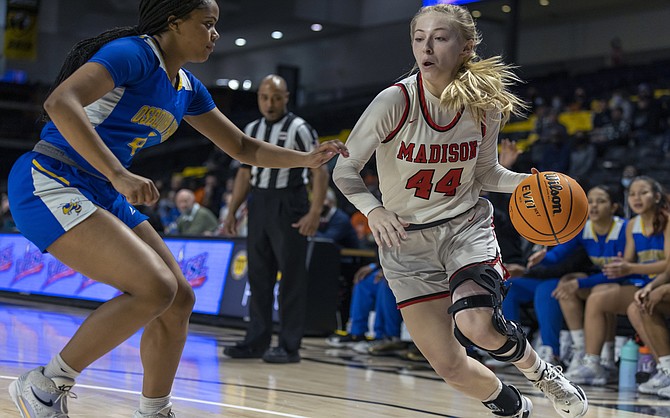 Katie Koshuta goes in for the basket.