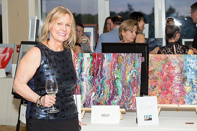 Artist Barbara Ely at Britepaths’ 2019 Artful Living event with her works, “Capsized” and “Japanese Tapestry.” Photo courtesy of John Glover