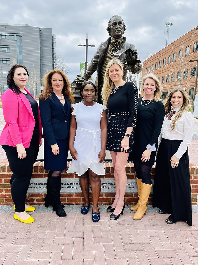 From left, Mary Bramley, Sally-Anne Andrew Pyne, Mariama Swarray-Deen, Katherine "Katie" Kuga Wenner, Christie Lavin, and Jayana Garvey at George Mason University announcing the establishment of the Holly Anne Kuga Endowment. Swarray-Deen is the first awardee under the announcement.