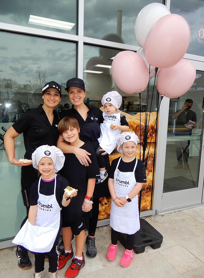 Chantilly Crumbl franchise owners (from left) Cami Fairbanks and Alli Bohls, with Bohls’s children, (from left) Charlie, 4; Ryker, 9; Logan, 2 and Ella, 6.