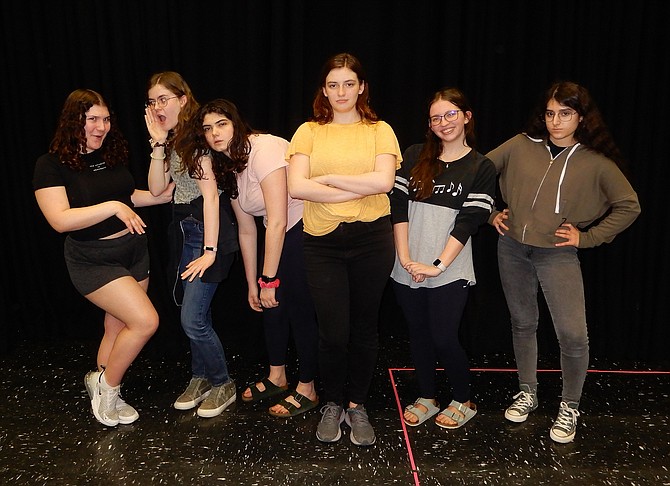 Portraying office secretaries are (from left) Anna Kaplan, Zoe Brennan, Natalie Kattas, Julia Manser, Elli Vlattas and Isabel Nemati.