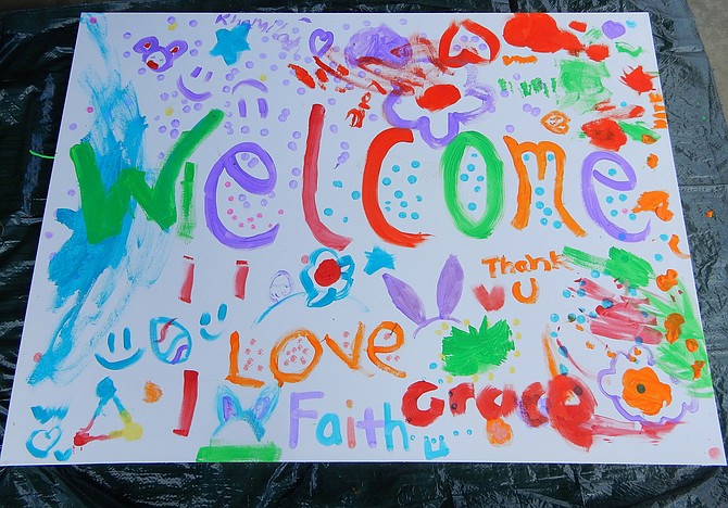 Children attending the festival created this mural to hang in The Lamb Center.