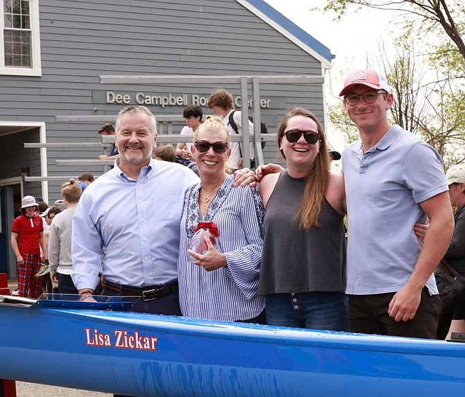 The Alexandria City High School Rowing program christened its new shell, the Lisa Zickar.