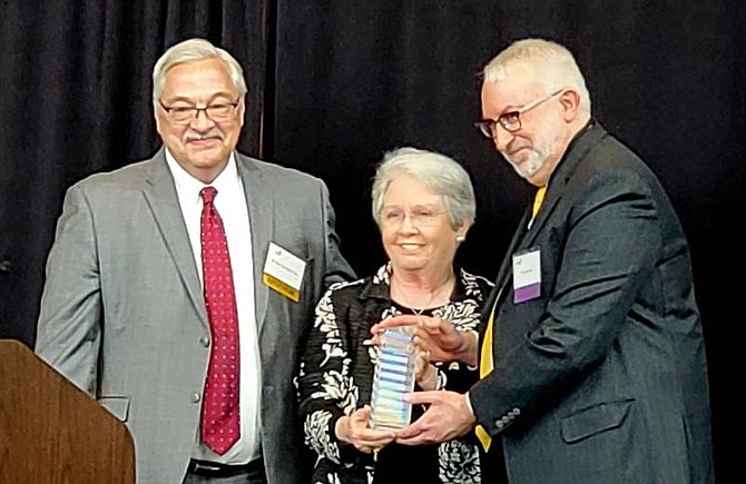 Tom Fleetwood with Kevin Greenlief, former FCRHA commissioner, and Katherine Hanley, former chairman of the Fairfax County Board of Supervisors for whom the award was named.