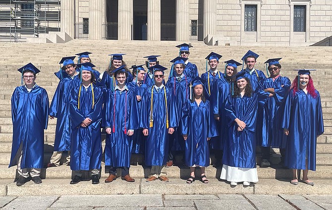 Class of 2022 graduates of Commonwealth Academy celebrate June 10 on the steps of the George Washington Masonic National Memorial.