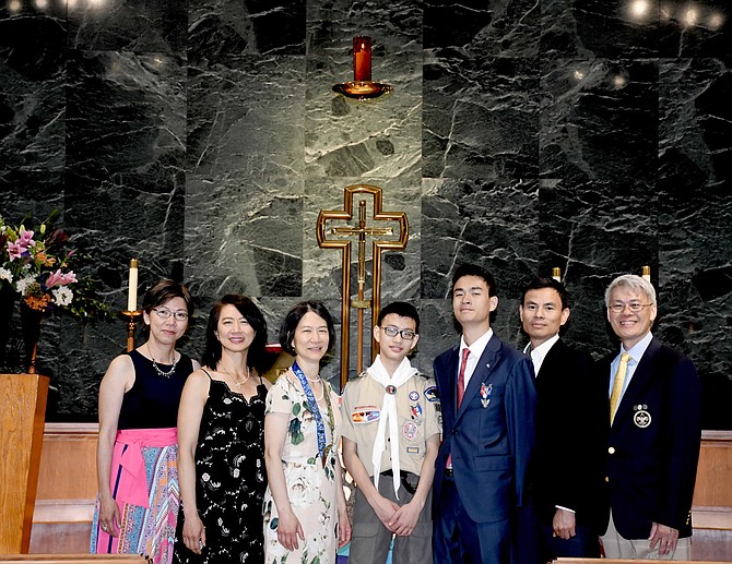 Extended family with Eagle Scout Minh-Vien Nguyen. His older brother on his left, Minh-Quan Nguyen, is also an Eagle Scout.
