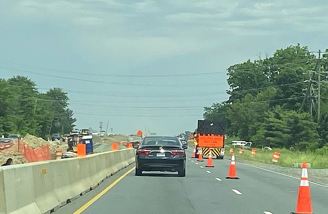 Route 28 southbound traffic traveling in a single lane, while the other lane is closed.