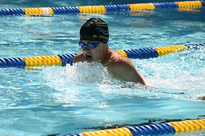 Max Thompson en route to breaking a 17 year old team record in the 11-12 boys 50 meter breaststroke. Max also broke the team record for  50 Butterfly (29.84).