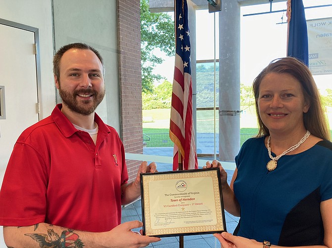 Human Resources Generalist Brendan Butler and Human Resources Director Tanya Kendrick received the V3 certificate on behalf of the Town of Herndon.