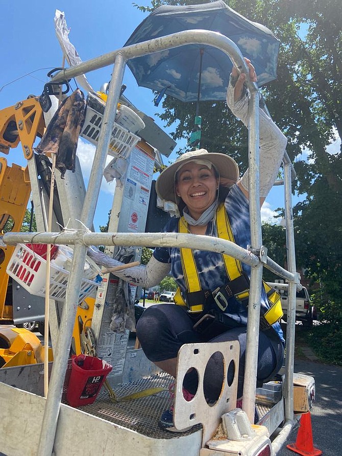 Marisela Rumberg and the cherry-picker basket