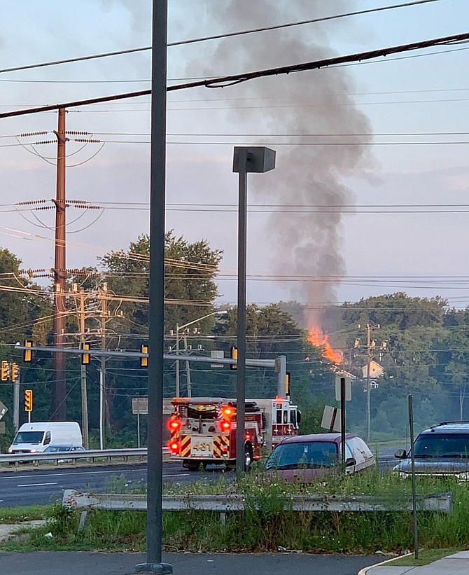 This fire engine is on the way to the scene of the fire.