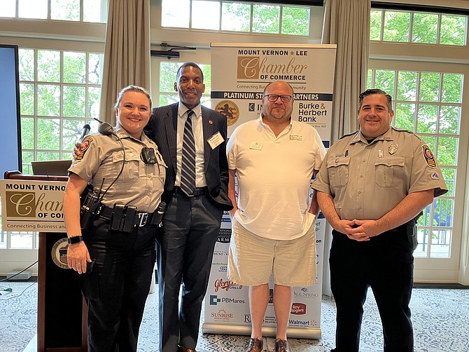 From left to right: PFC Katie Watts, FCPD Mt. Vernon District Community Outreach, Supervisor Rodney Lusk, chair of the Board of Supervisors Public Safety Committee, Mark Murray, Immediate Past Chair, MPO Sean Corcoran, FCPD Franconia District Station Crime Prevention. Image courtesy of the Mount Vernon Lee Chamber of Commerce.