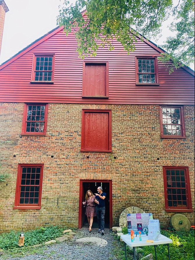 Guests exit Colvin Run Mill after a tour