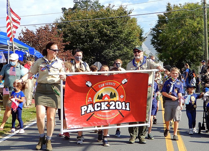 Cub Scout Pack 2011 marches in last year’s Centreville Day parade.