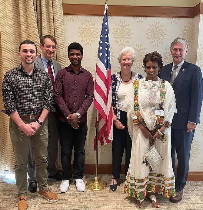 Congressman Don Beyer, right, poses for a photo with new U.S. citizens as part of a ceremony Sept. 16 at Goodwin House. Shown are Ali Cherchar, Goodwin Living president and CEO Rob Liebreich, Emmanuel Nkiruka,  Goodwin House resident and tutor Judy Hansen, and Yehula Azene.