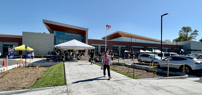 The new building, parking area, and rain gardens present a new modern structure in the Richmond Highway corridor