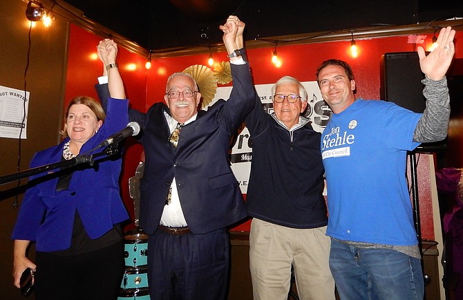 Celebrating their victories are (from left) Catherine Read, Gerry Connolly, Tom Ross and Jon Stehle.