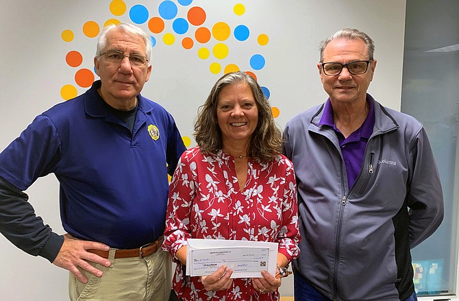 On Oct.12, representatives from American Legion Post 177 in Fairfax City presented Britepaths with a check for $2,500 to help provide gift cards to families in need for holiday meals. From left are Post 177 Finance Officer Mike Kimlick, Britepaths Executive Director Lisa Whetzel and Post 177 Commander Jeffrey White.