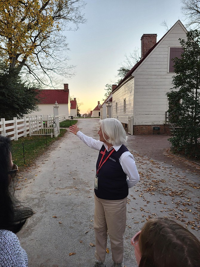 Historic interpreter Betty Brown narrates a candlelight tour.