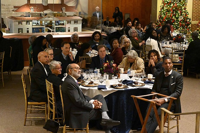 The head table: Clockwise from front included Rev. Clyde Nelson, who gave the opening and closing prayers; Denise Williams; Speaker Gary Flowers; Mount Vernon School Board member Karen Corbett Sanders; Mount Vernon Supervisor Dan Storck; Del. Paul Krizek; Sheila Coats and her niece, Journey: and Franconia Supervisor Rodney Lusk.