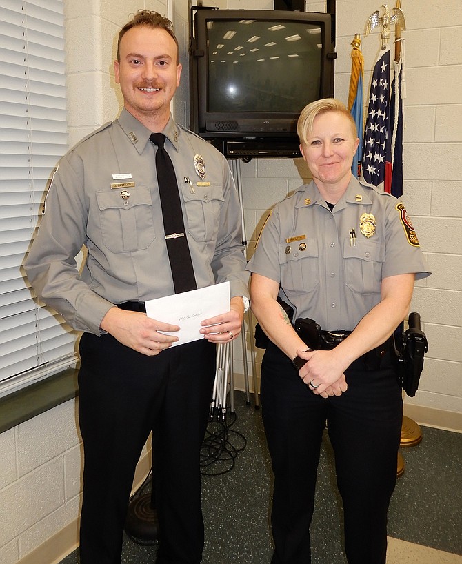 PFC Joseph Castilon, left, with Capt. Rachel Levy, the Sully District Station’s commander.