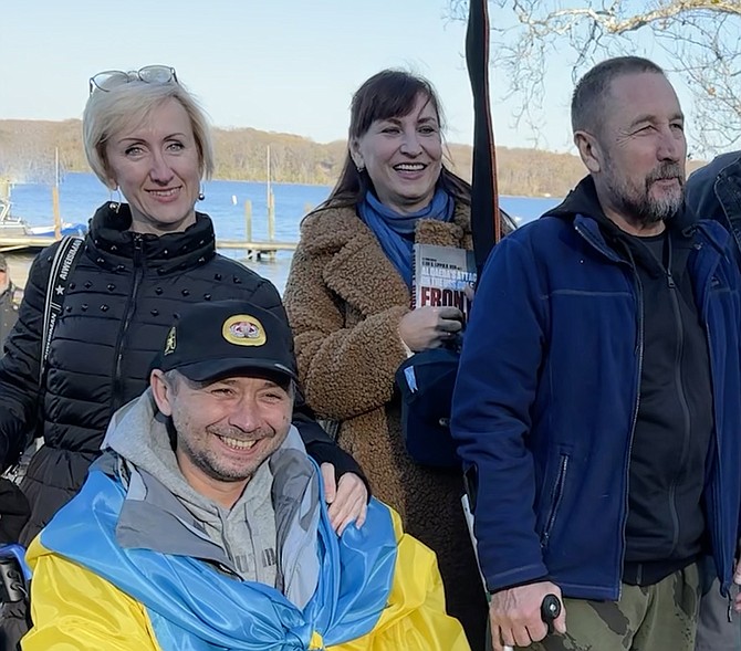 Iryna Tyshchenko and Iryna Kirda support their husbands on a easier day safely within the borders of the United States