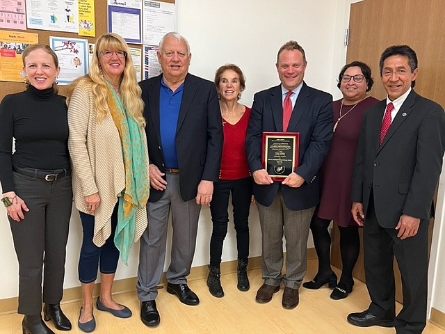 Pictured are: SEEC Board Members Suzette Lohmeyer, Susan Randall, SEEC Executive Director Andres Tobar, Clare Cherkasky, Arlington Thrive Executive Director Andrew Schneider, SEEC Board Chair Sally Diaz-Wells and SEEC Founding President J. Walter Tejada.