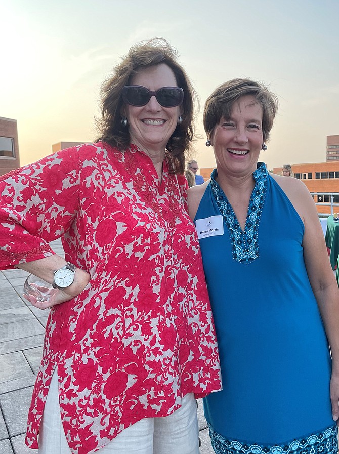 Alexandria Seaport Foundation board chair Helen Morris, right, with Charlotte Hall of the Old Town Business Association at the Wine on the Water ASF fundraiser Sept. 17 at Canal Center Plaza.