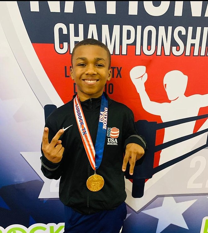 Terriel Cooke Jr. celebrates his gold medal victory at the USA Boxing National Championships Dec. 10 in Lubbock, Texas.