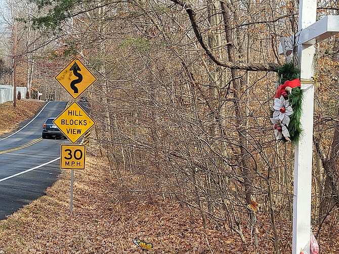 Warning signs indicate the limited visibility in this spot on Lee Chapel Road in Fairfax Station.