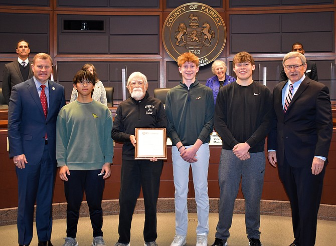 The Board of Supervisors recognized Coach Al Berg and the Langley High School Saxons' golf team for winning the Virginia High School Leagues' Class 6 COVID Championship in October 2022.